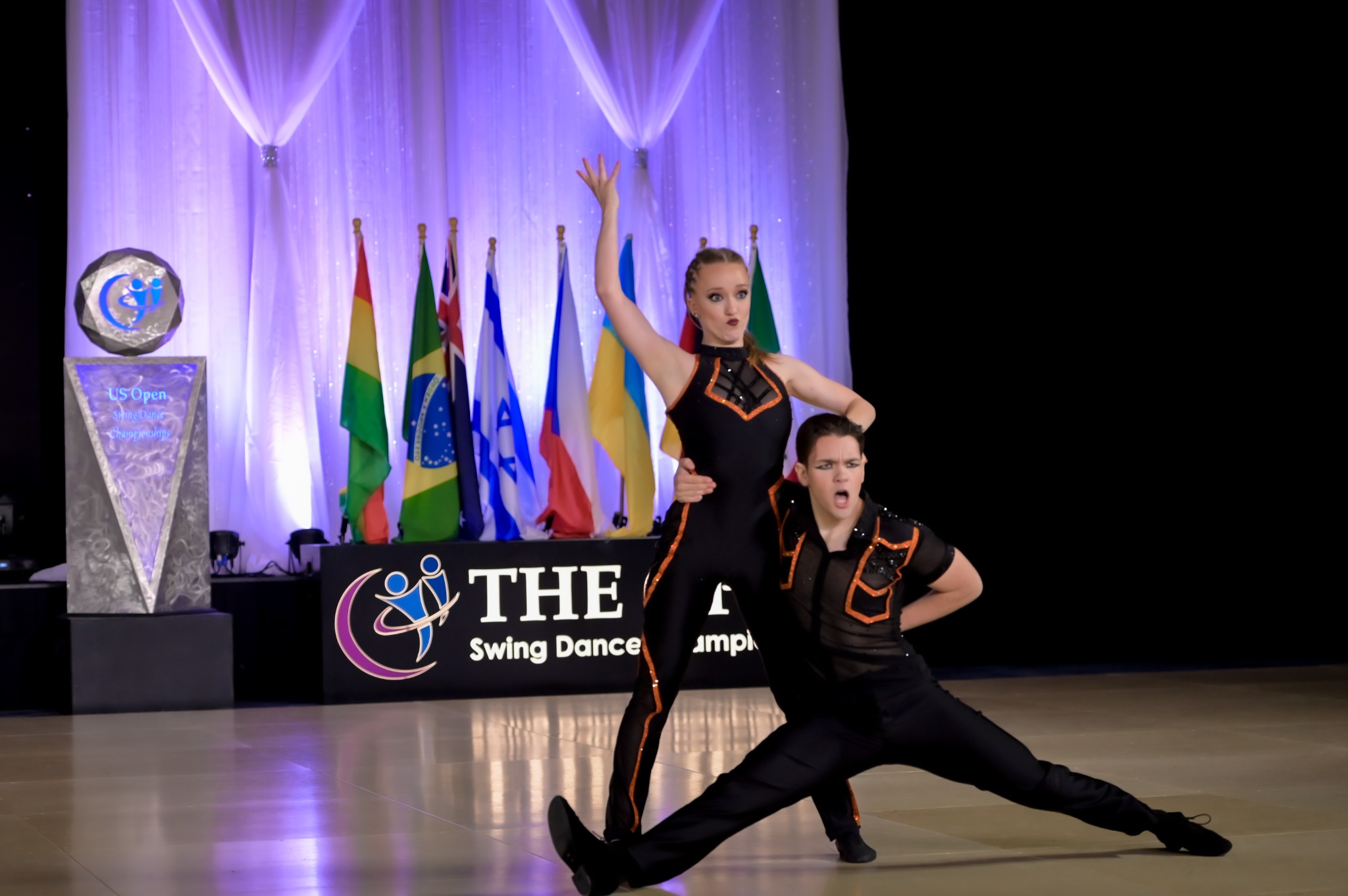 Jaden and Kenzie celebrating on the dance floor